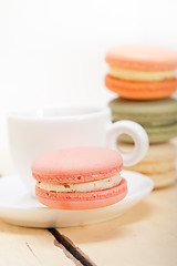 Image showing colorful macaroons with espresso coffee 