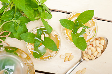 Image showing Arab traditional mint and pine nuts tea