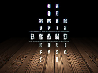 Image showing Advertising concept: word Brand in solving Crossword Puzzle