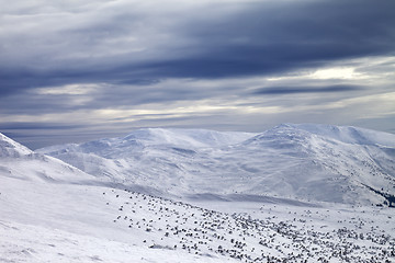 Image showing Winter mountains and gray sky
