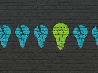 Image showing Business concept: light bulb icon on wall background