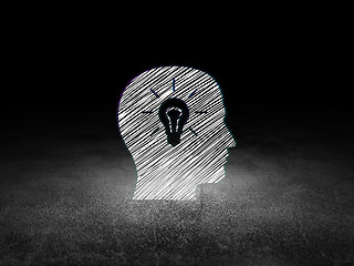 Image showing Finance concept: Head With Light Bulb in grunge dark room