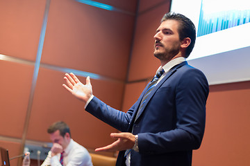 Image showing Speaker giving talk at Business Conference.