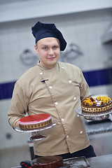 Image showing chef preparing desert cake in the kitchen