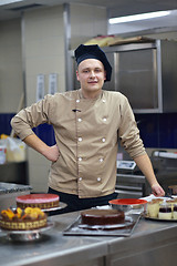 Image showing chef preparing desert cake in the kitchen