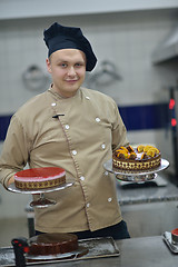 Image showing chef preparing desert cake in the kitchen