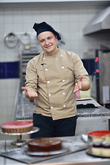 Image showing chef preparing desert cake in the kitchen