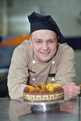 Image showing chef preparing desert cake in the kitchen