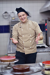 Image showing chef preparing desert cake in the kitchen