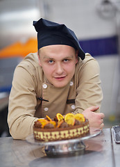 Image showing chef preparing desert cake in the kitchen