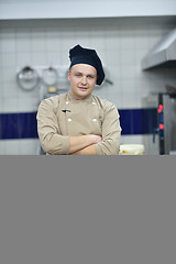 Image showing chef preparing desert cake in the kitchen