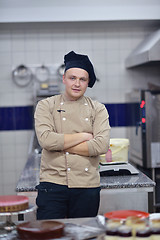 Image showing chef preparing desert cake in the kitchen