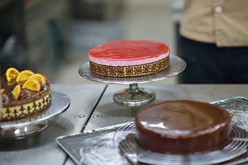 Image showing chef preparing desert cake in the kitchen