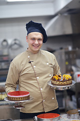 Image showing chef preparing desert cake in the kitchen