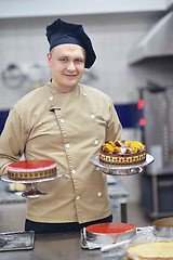 Image showing chef preparing desert cake in the kitchen