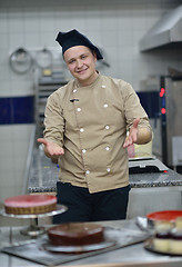 Image showing chef preparing desert cake in the kitchen