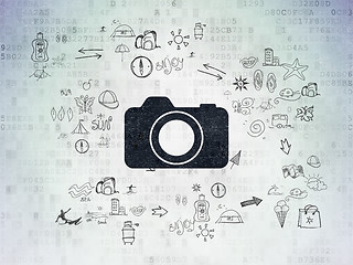 Image showing Tourism concept: Photo Camera on Digital Paper background