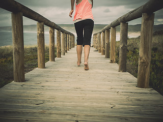 Image showing Beautiful woman running