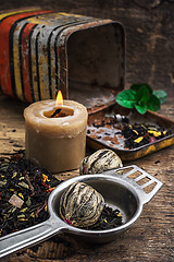 Image showing tea brew with lime and mint on wooden background 