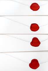 Image showing group of white letters with red sealing wax