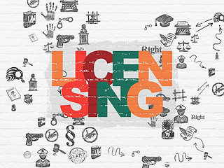 Image showing Law concept: Licensing on wall background