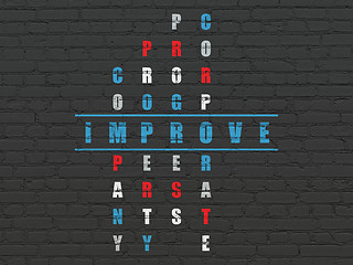 Image showing Finance concept: word Improve in solving Crossword Puzzle