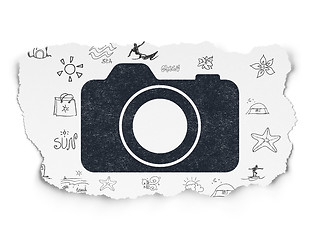 Image showing Vacation concept: Photo Camera on Torn Paper background