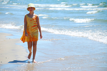 Image showing Girl walk beach