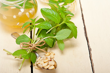 Image showing Arab traditional mint and pine nuts tea