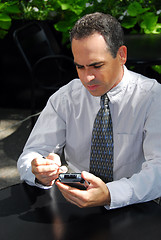 Image showing Businessman pda