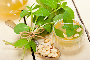 Image showing Arab traditional mint and pine nuts tea