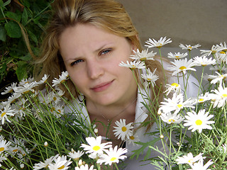 Image showing Girl with daisies