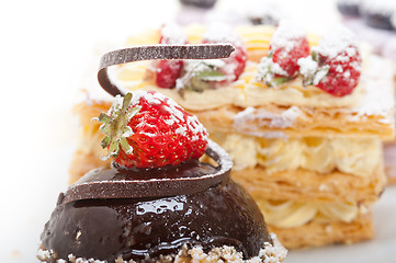 Image showing selection of fresh cream cake dessert plate 