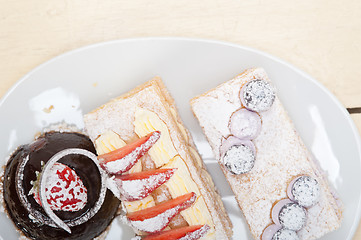 Image showing selection of fresh cream cake dessert plate 