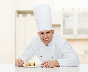 Image showing happy male chef cook with dessert