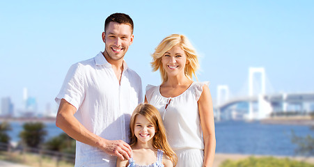 Image showing happy family over rainbow bridge background