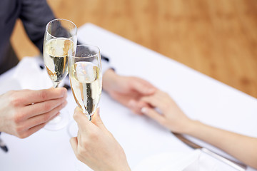 Image showing couple with glasses of champagne at restaurant