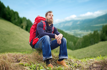 Image showing man with backpack hiking