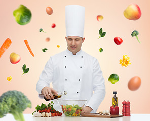 Image showing happy male chef cook cooking food