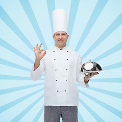 Image showing happy male chef cook with cloche showing ok sign