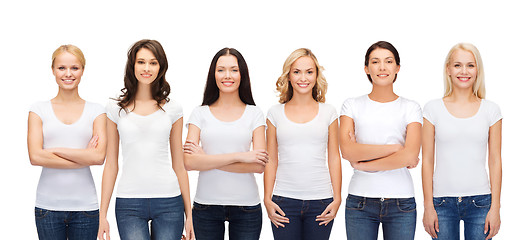 Image showing group of smiling women in blank white t-shirts