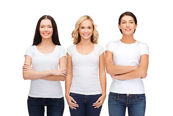 Image showing group of smiling women in blank white t-shirts