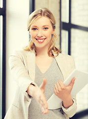 Image showing woman with an open hand ready for handshake