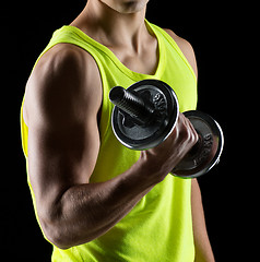 Image showing young man with dumbbell