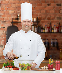 Image showing happy male chef cook cooking food