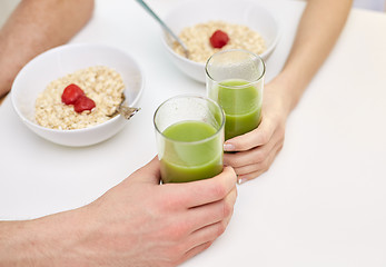 Image showing close up of couple having breakfast at home