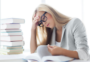 Image showing student with books and notes