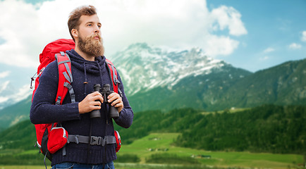 Image showing man with backpack and binocular outdoors