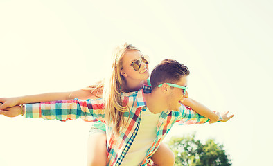 Image showing smiling couple having fun in park