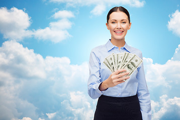 Image showing businesswoman with dollar cash money